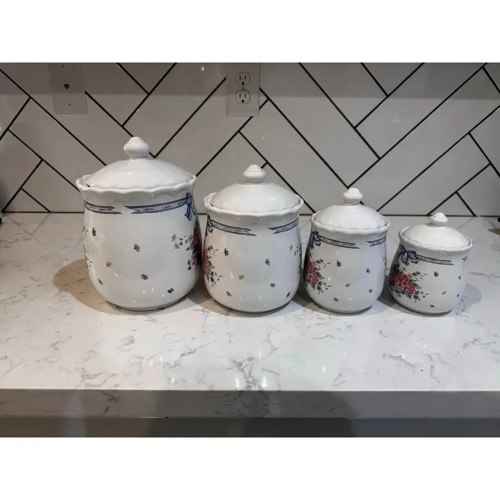four ceramic kitchen canisters floral bouquet blue ribbon bow 90s cotton prairie